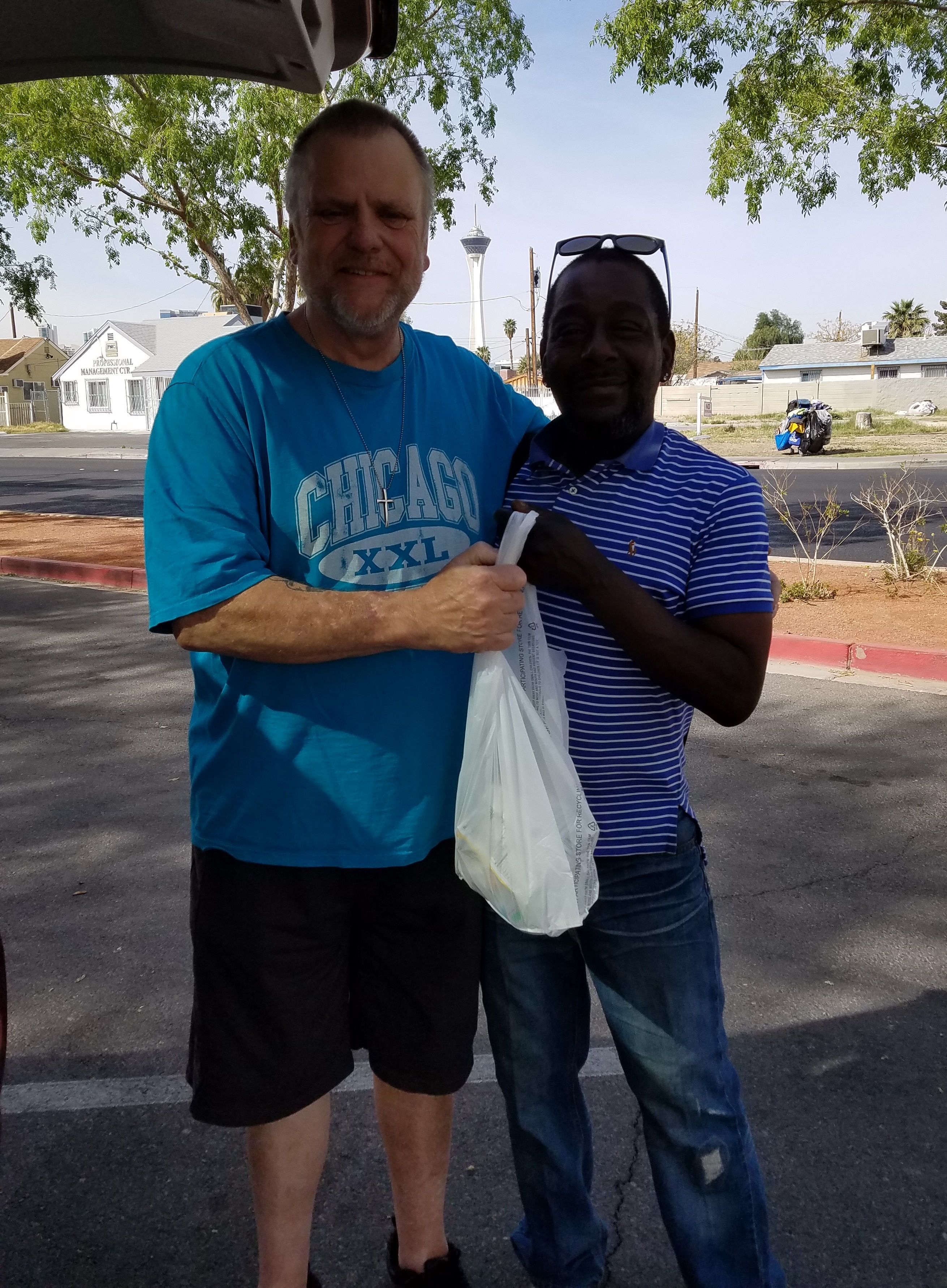 Bill handling out food