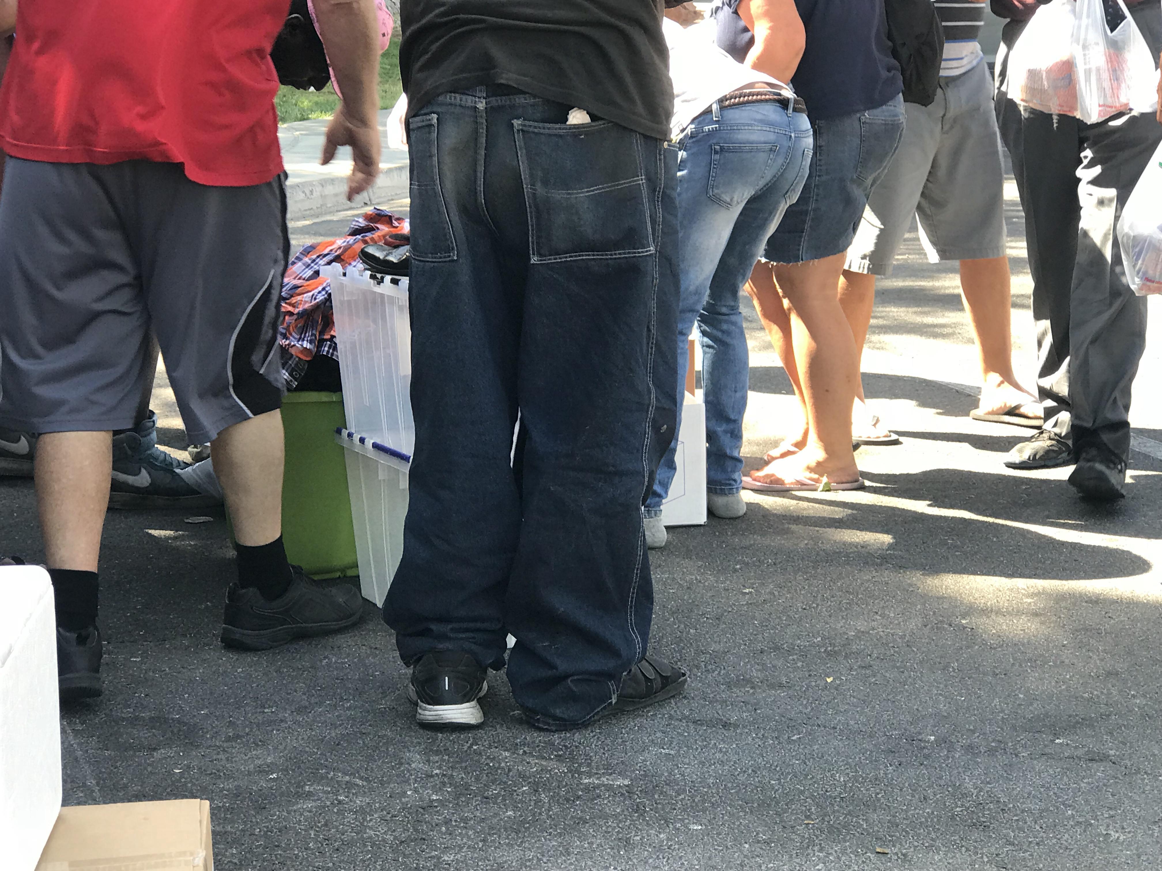 Waiting_for_their_chance_to_go_through_the_donations