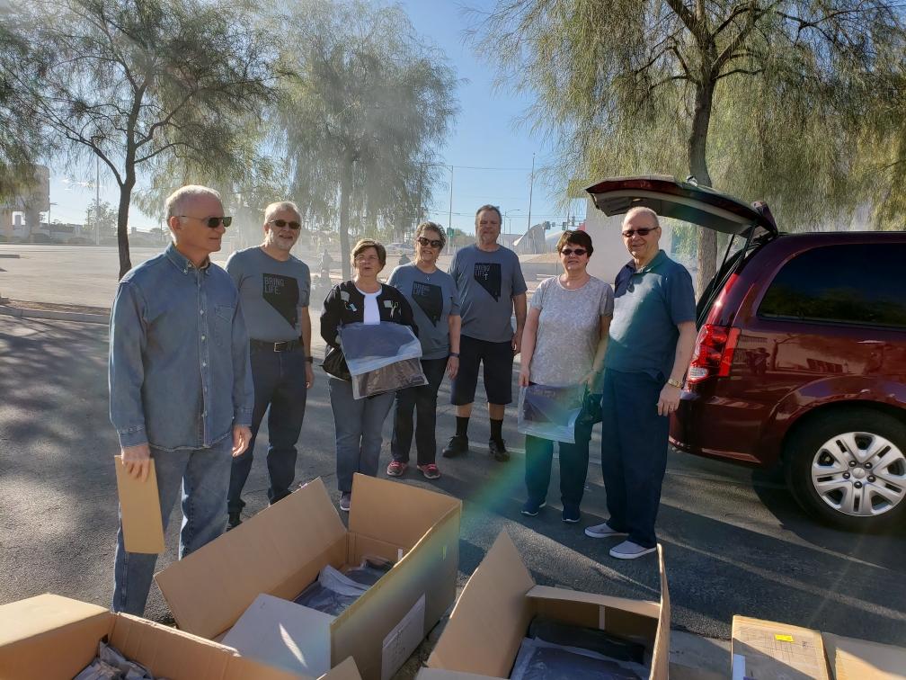 Serve Day 10-20-18 Handing out Sweaters to the Homeless